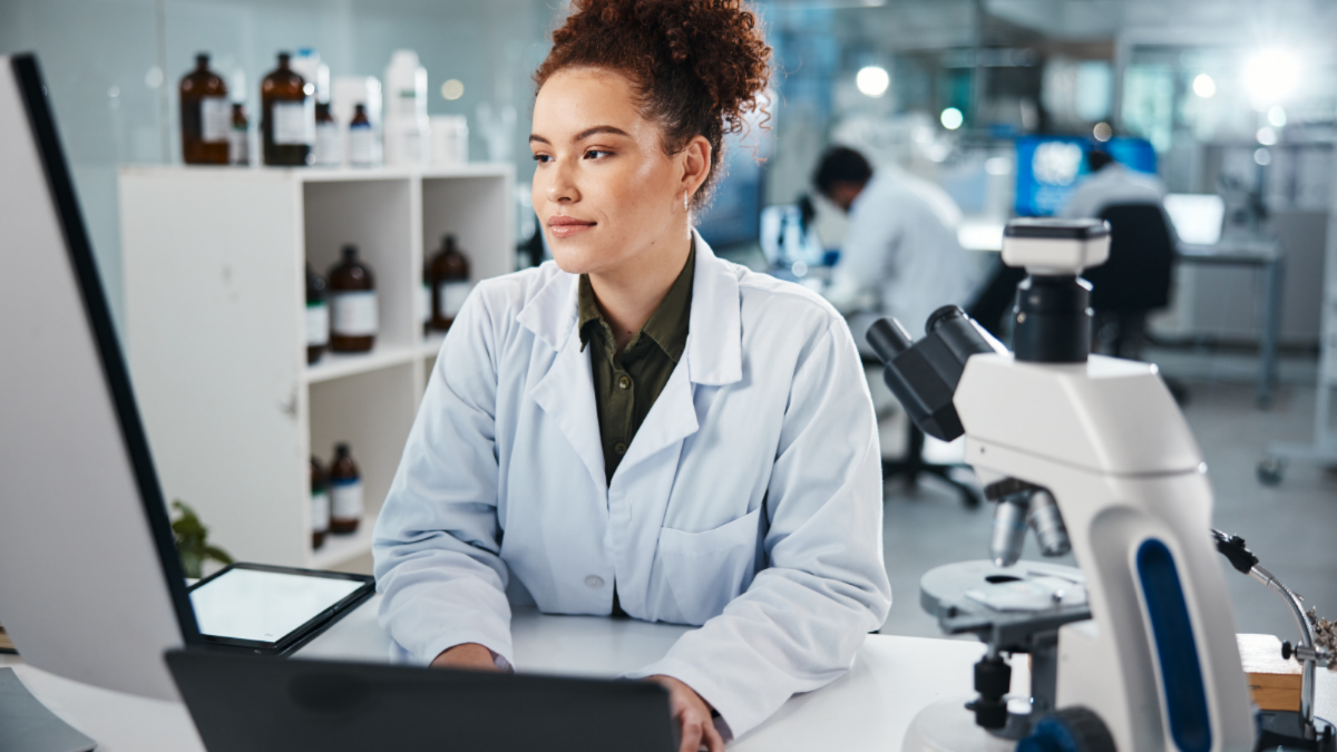 IVD laboratory specialist reviewing diagnostic data